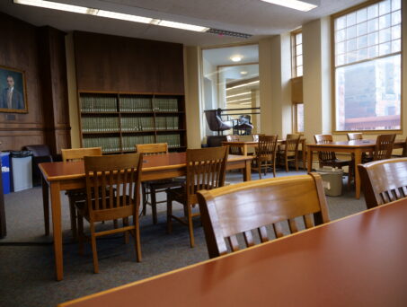 Wood-sided room and wood desks. Click on this picture to reserve this room.